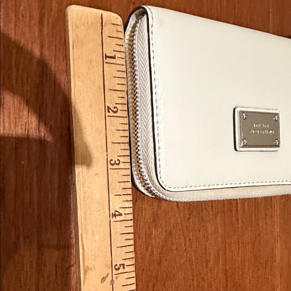 Michael Kors Ivory Wristlet with Silver Accents - Picture 9 of 9